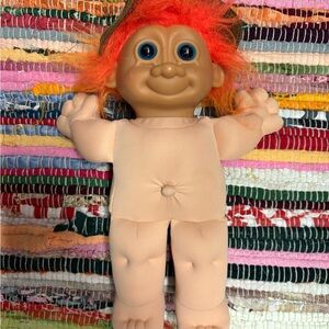 Russ Troll Doll with Vibrant Orange Hair and Blue Eyes